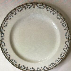 Elegant Cream Dinner Plate with Blue and Gold Accents
